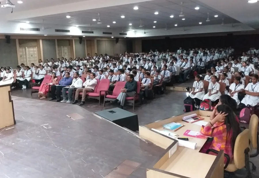 Students in an auditorium at CES