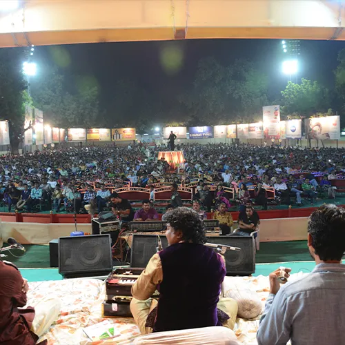 A large evening audience at a centenary programme
