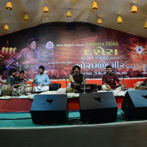 Musicians on stage at a centenary cultural programme